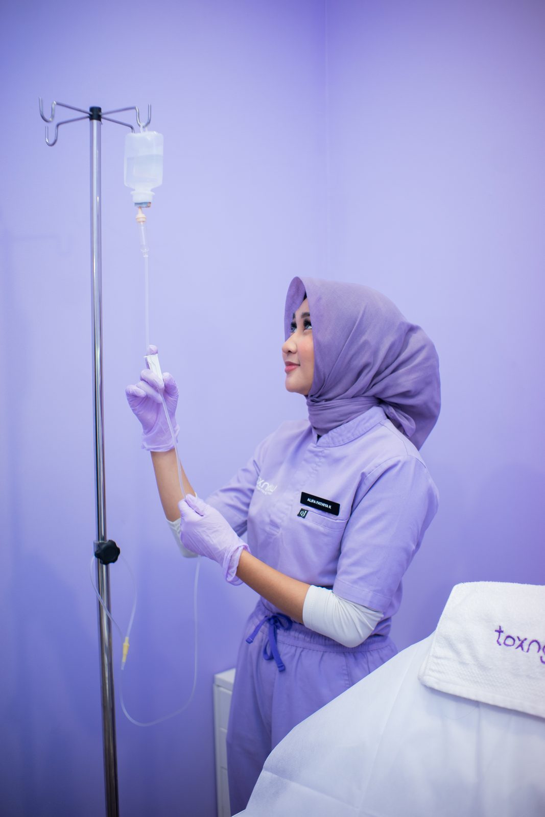 Toxnglow staff preparing for treatment